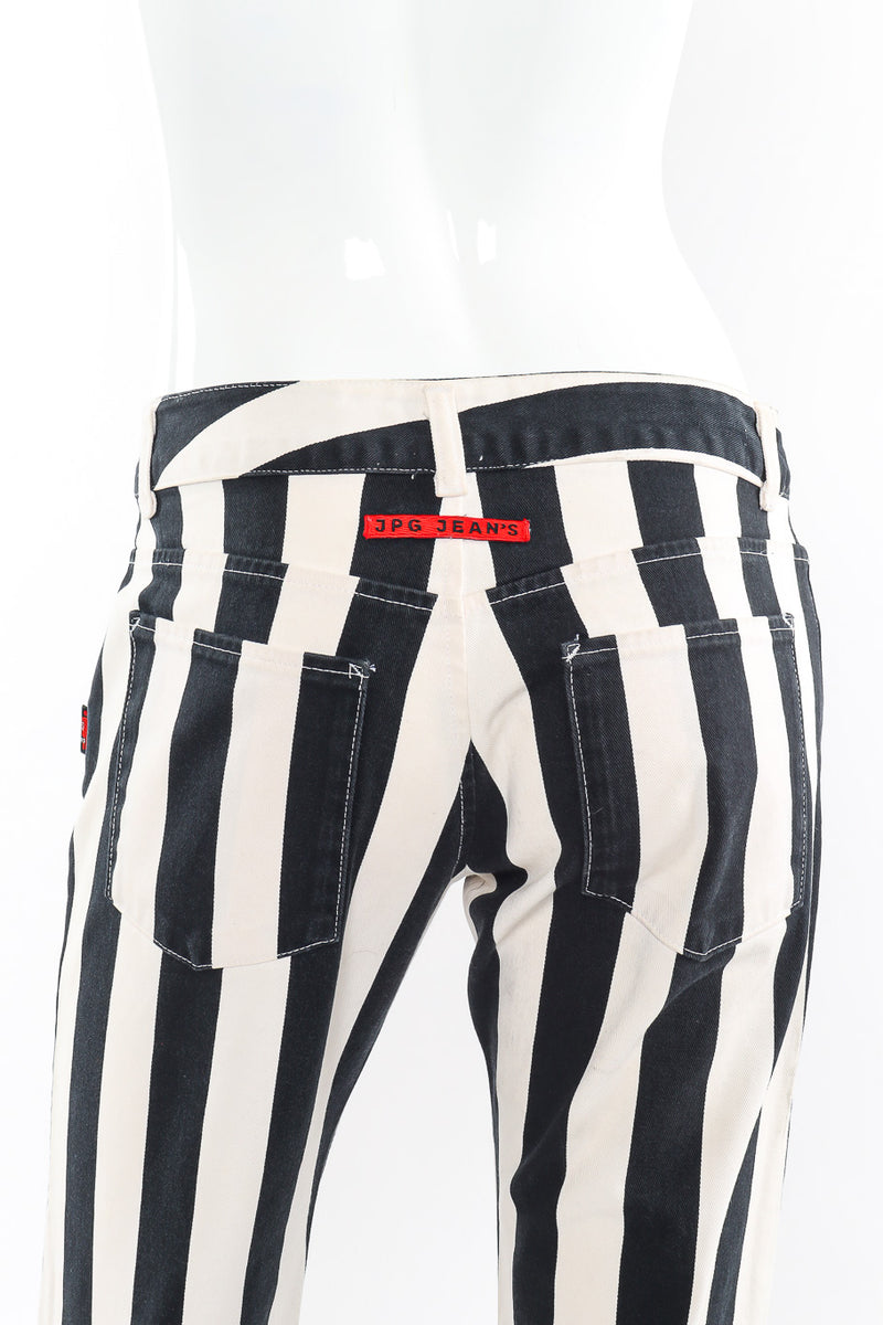 JPG logo jeans by Jean Paul Gaultier photo on mannequin of back details. @recessla.