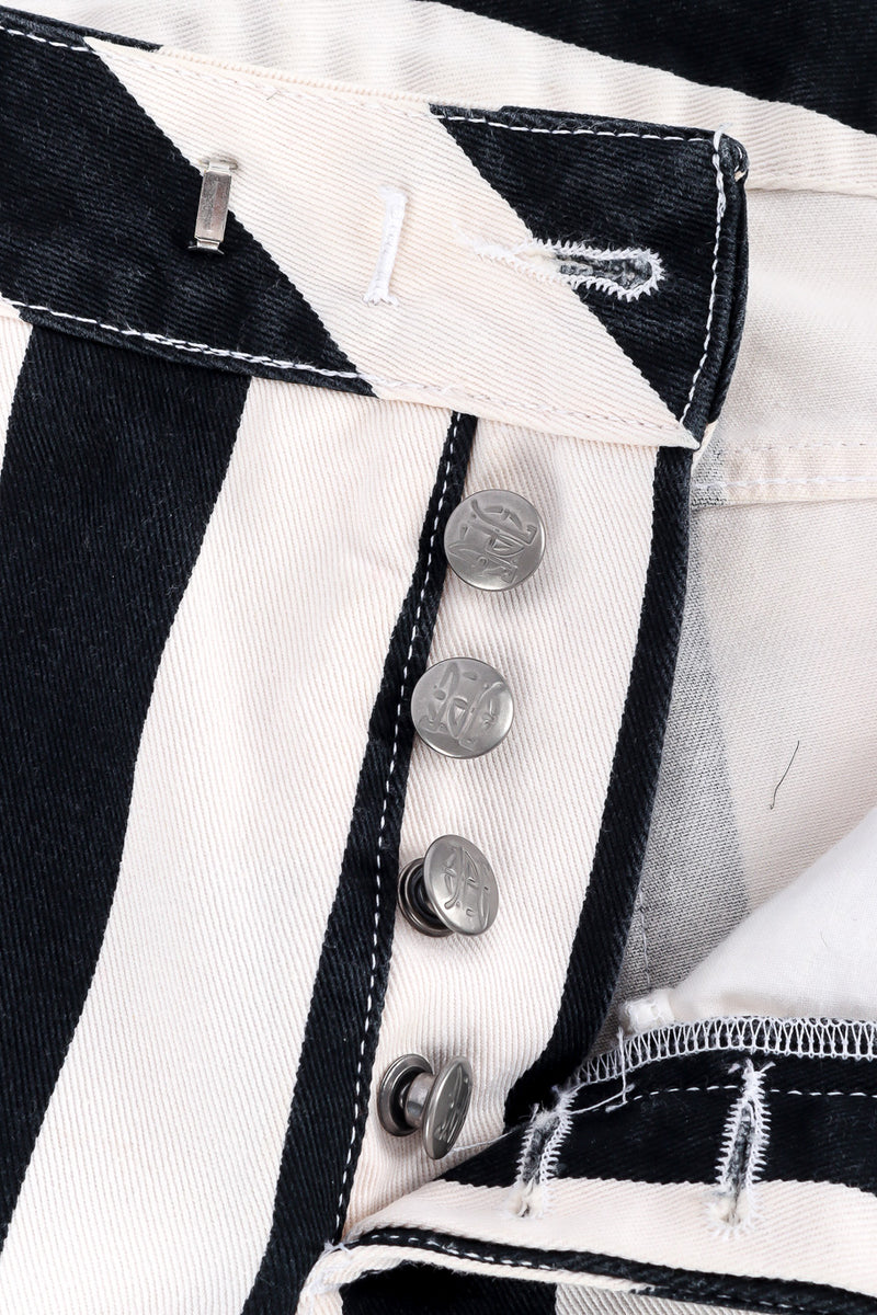 JPG logo jeans by Jean Paul Gaultier photo of closure buttons. @recessla.