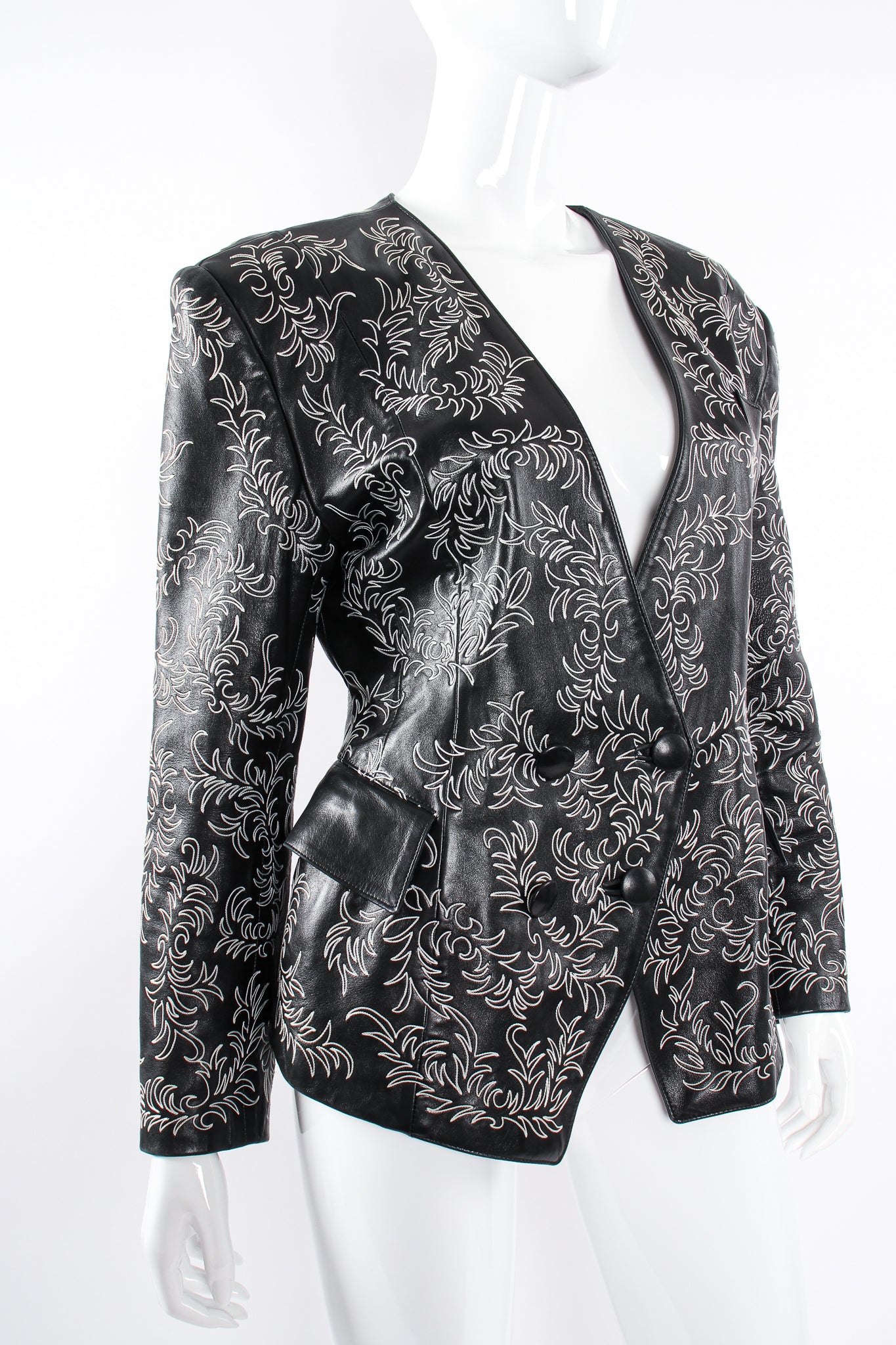 Vintage Jean Claude Jitrois Embroidered Collarless Leather Jacket on mannequin angle at Recess LA