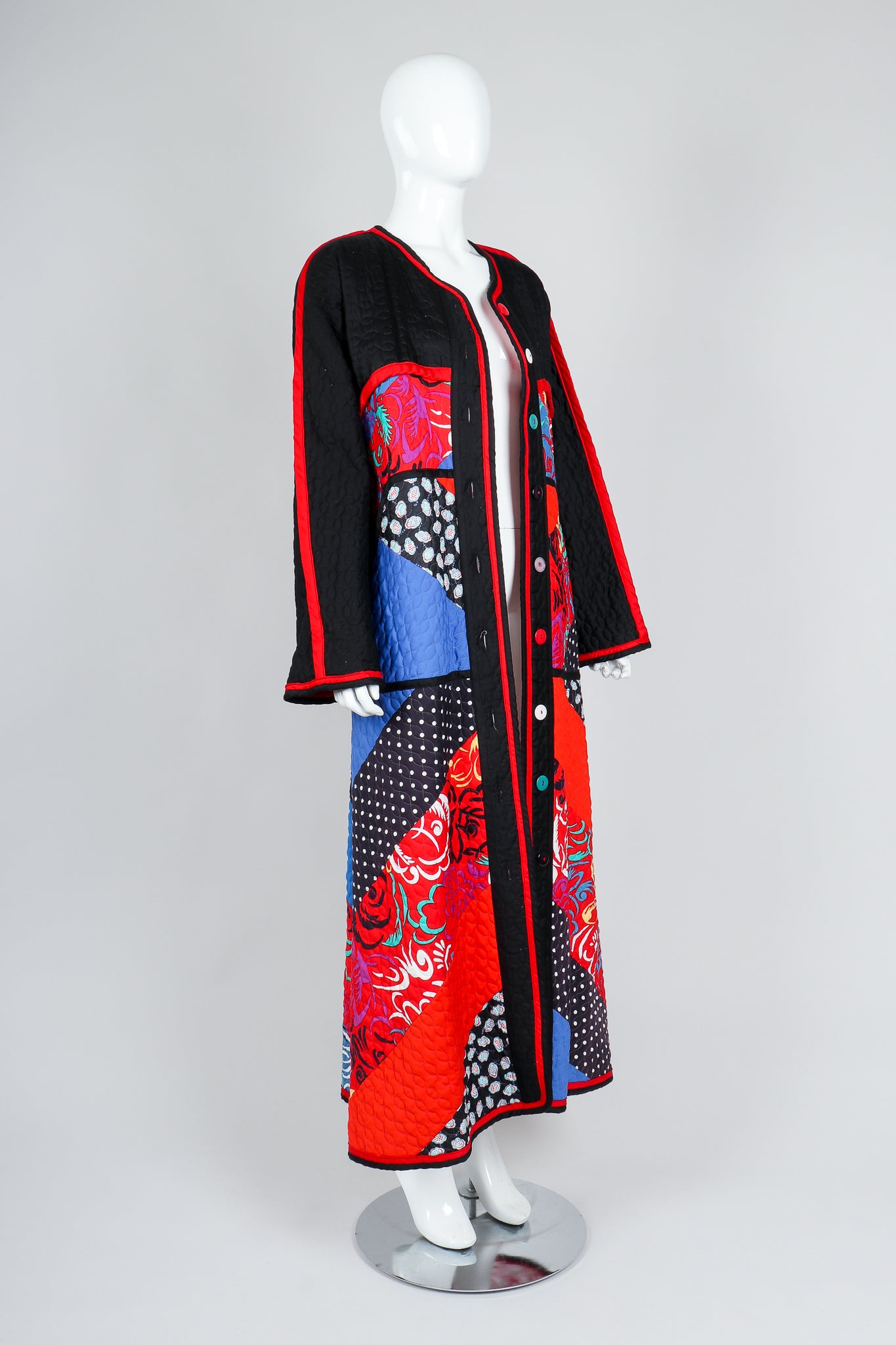 Recess Vintage Jeanne Marc Multicolor Quilted Patchwork Duster Coat on Mannequin, angled