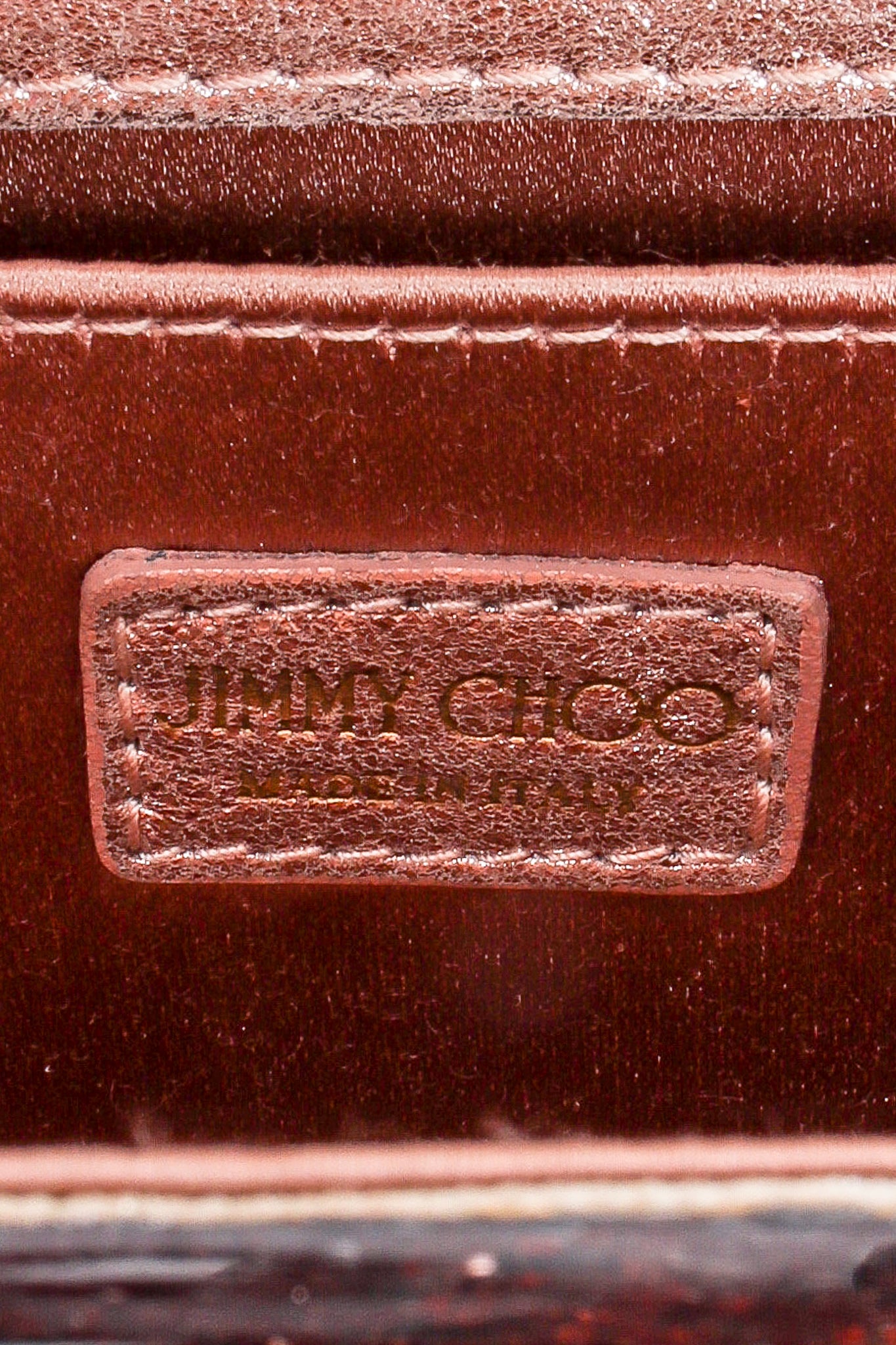 Jimmy Choo Two-Tone Acrylic Glitter Clutch Bag label at Recess Los Angeles