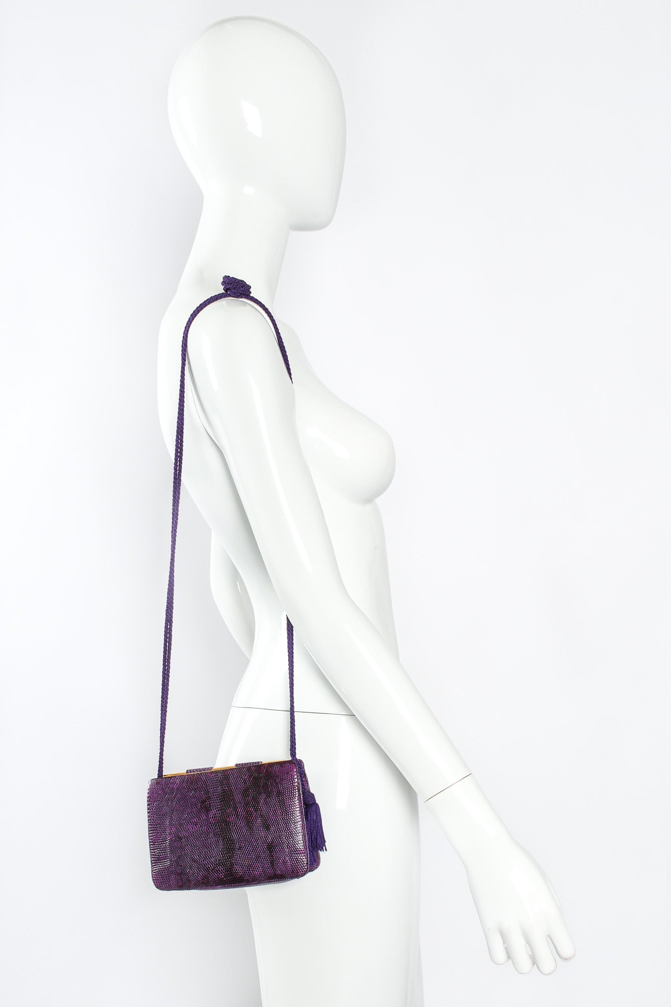 Vintage Judith Leiber Reptile Leather Mini Clutch Bag on mannequin shoulder @ Recess Los Angeles