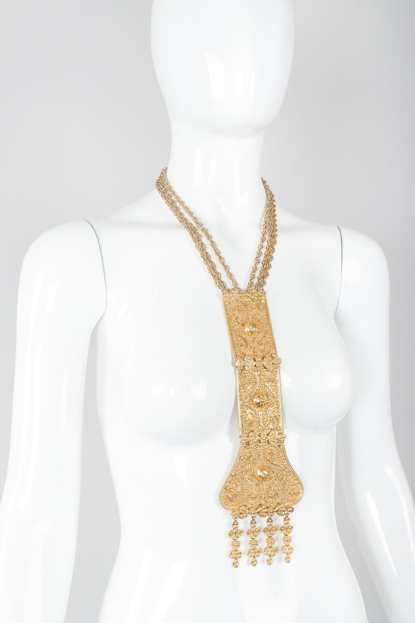 Vintage Judith Leiber Golden Long Filigree Plate Y Necklace on Mannequin