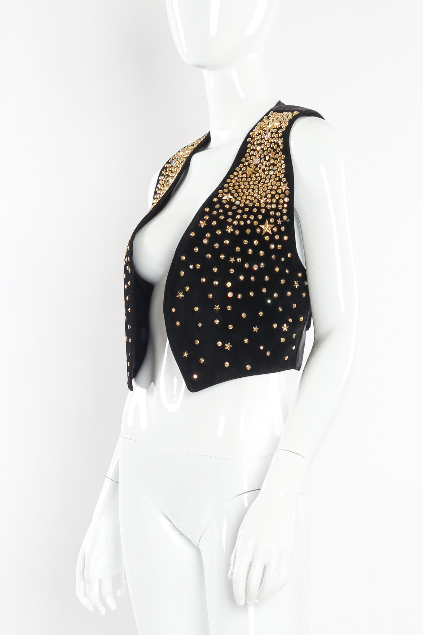 Leather vest with eclectic star and opalescent studs by K. Baumann three quarter view tied @recessla