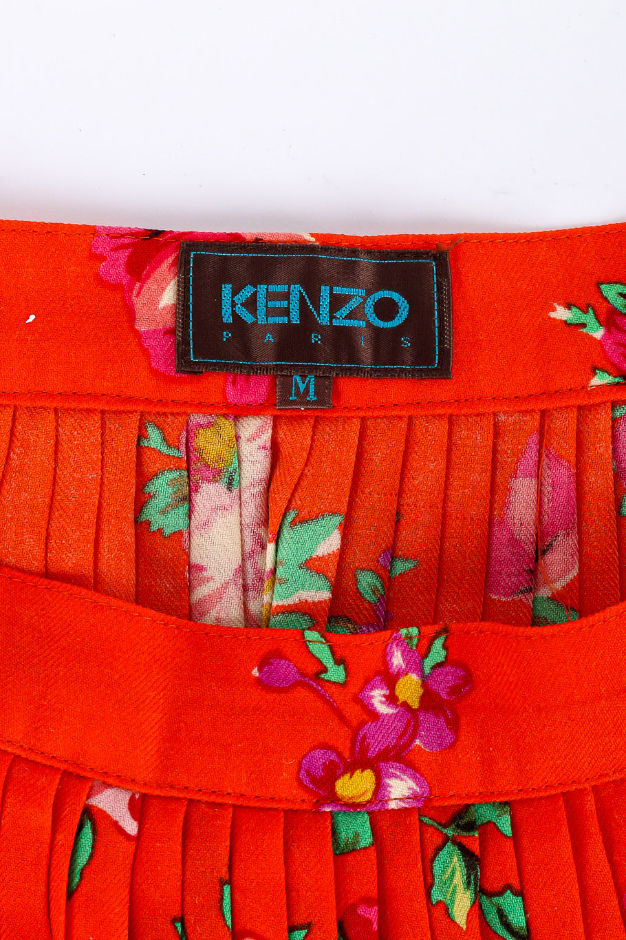 Bright floral pleated skirt by Kenzo Paris label close up @recessla