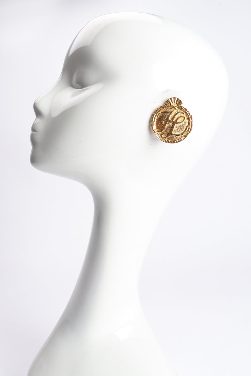 Vintage Karl Lagerfeld Gold Monogram Logo Button Earrings on Mannequin at Recess Los Angeles