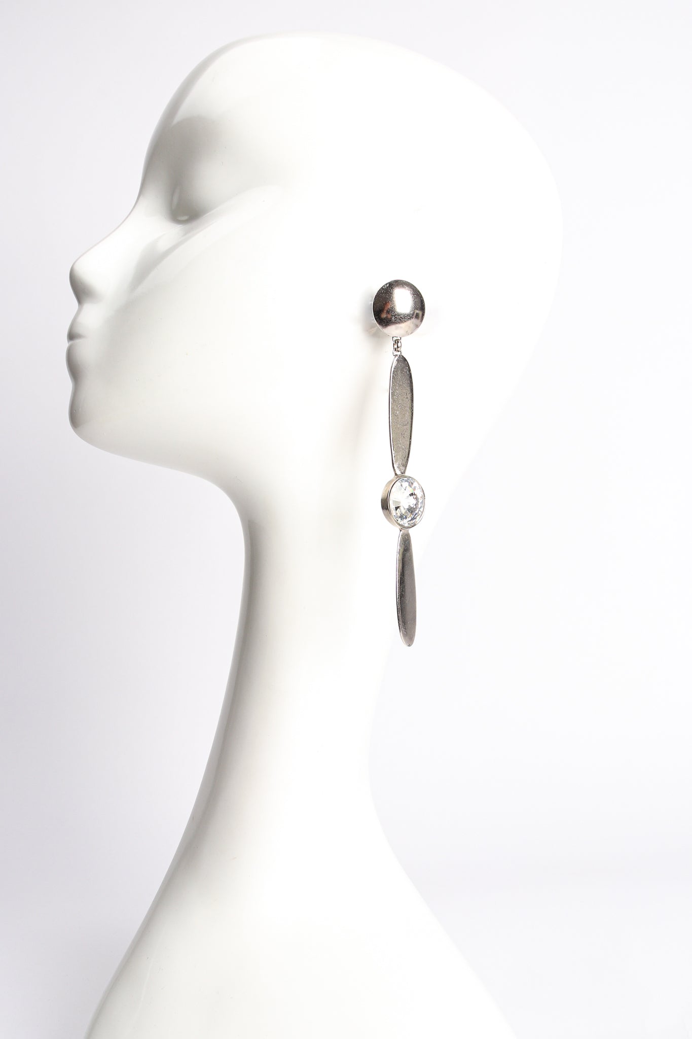 Vintage Krizia Rhinestone Propeller Drop Earrings on mannequin at Recess Los Angeles