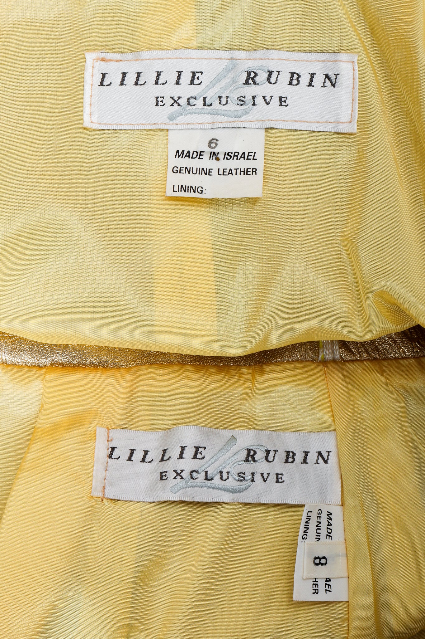 Vintage Lillie Rubin Gold labels on yellow lining fabric