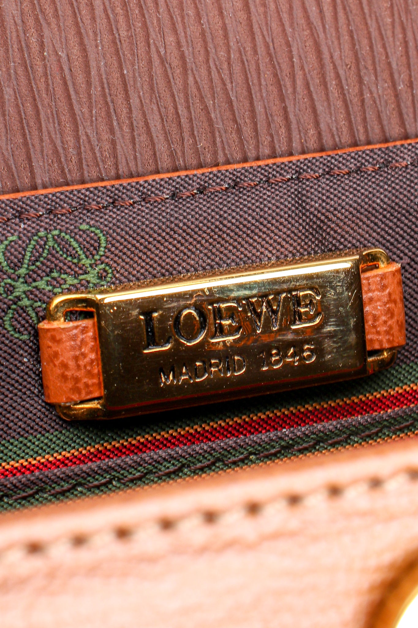 Vintage Loewe Spain Twist Handle Barrel Flap Satchel Bag metal signature plate at Recess LA