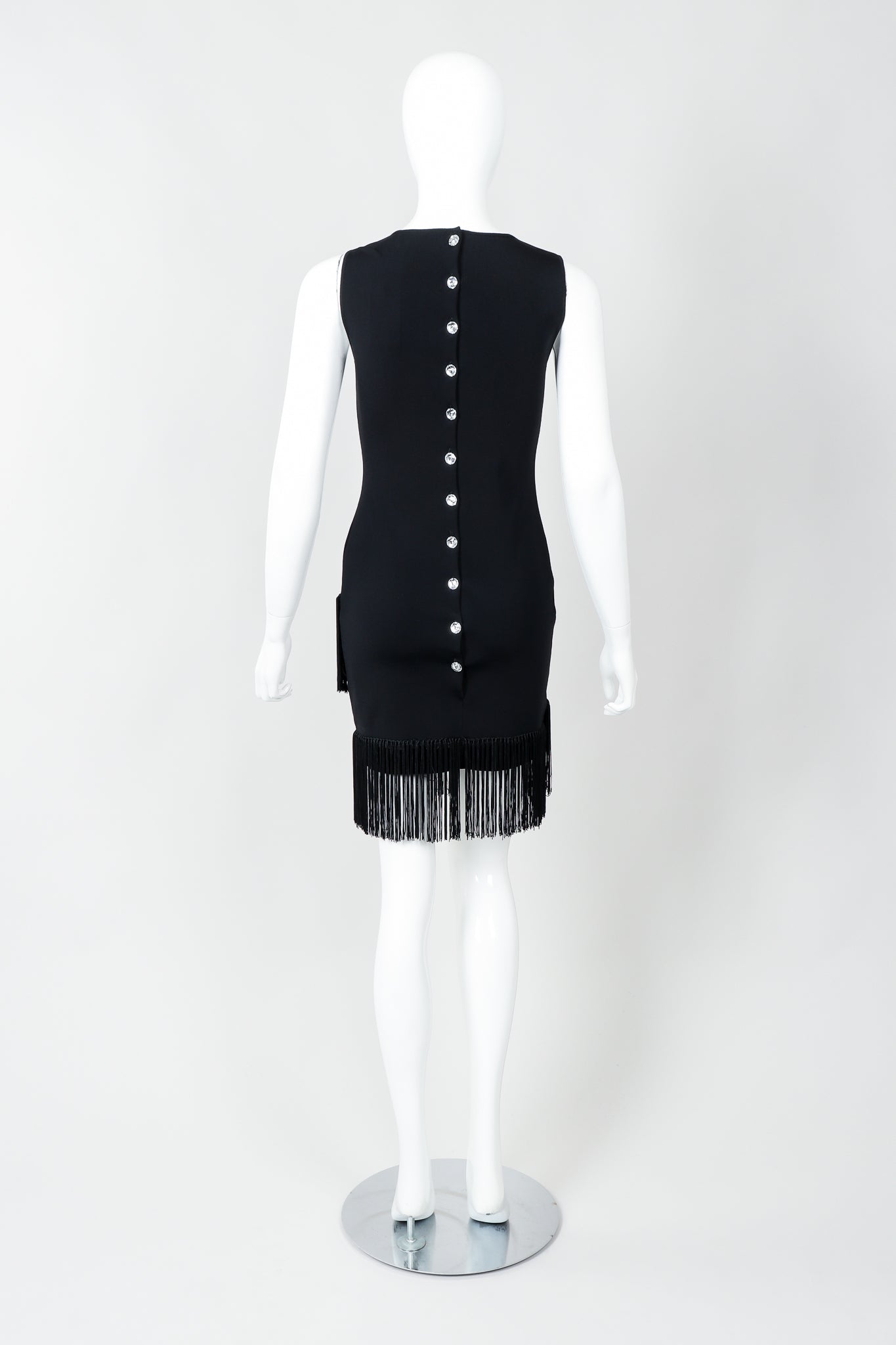 Vintage Loris Azzaro Asymmetrical Fringe Hem Dress on Mannequin, back at Recess Los Angeles