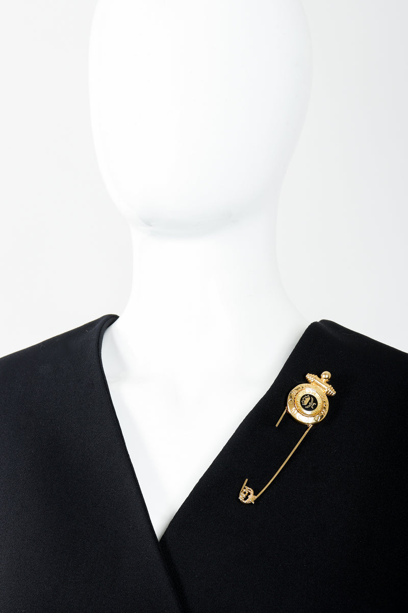Vintage MCM Gold Logo Safety Pin Brooch on Mannequin at Recess Los Angeles