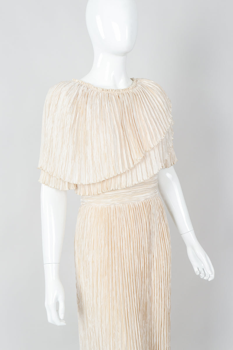 Vintage Mary McFadden Cream Pleated Asymmetrical Draped Collar Dress on Mannequin crop at Recess
