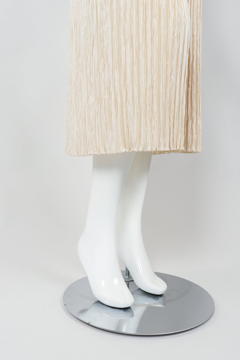 Vintage Mary McFadden Cream Pleated Asymmetrical Draped Collar Dress on Mannequin Skirt Hem