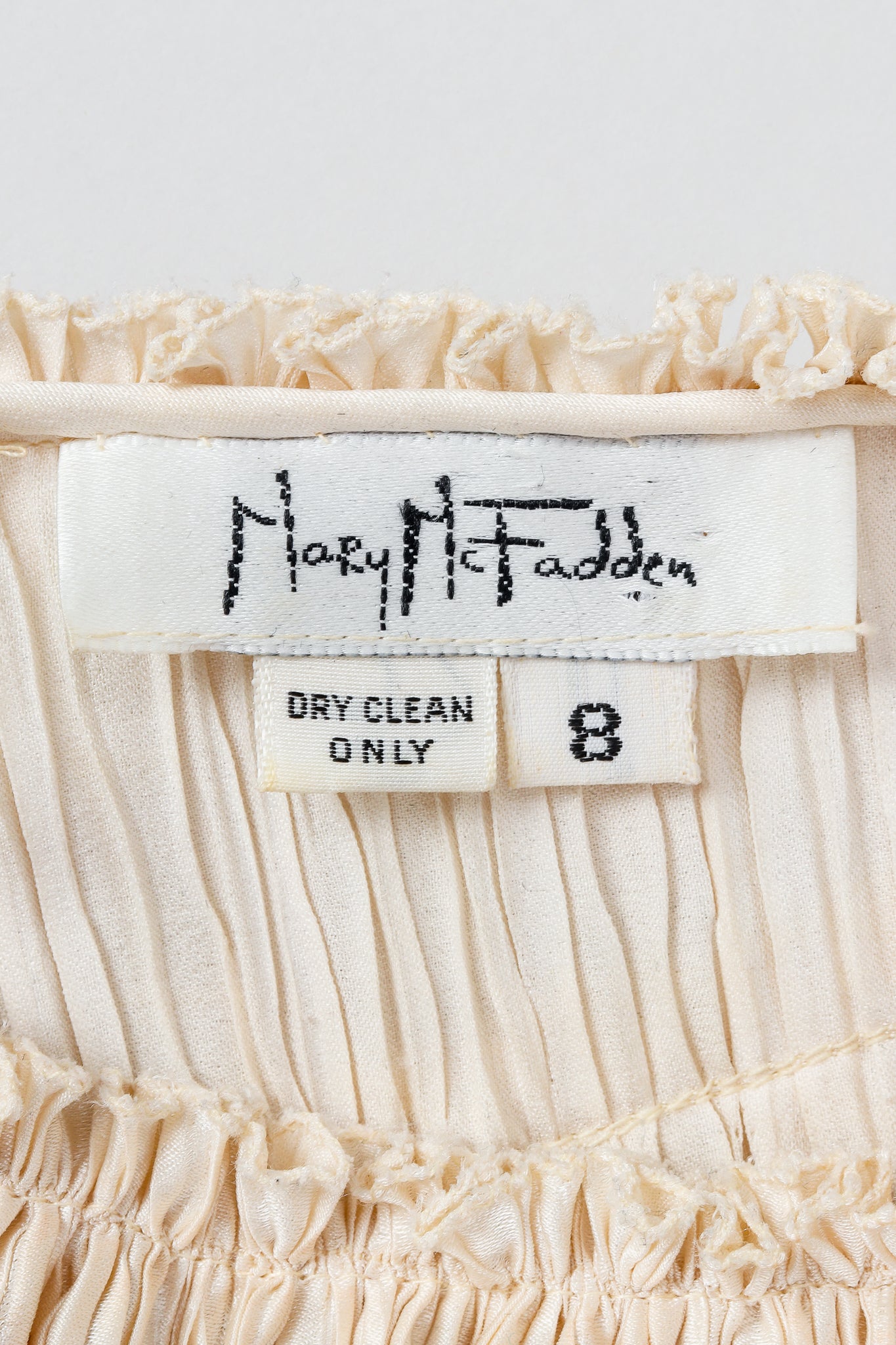 Vintage Mary McFadden Label on Cream fabric
