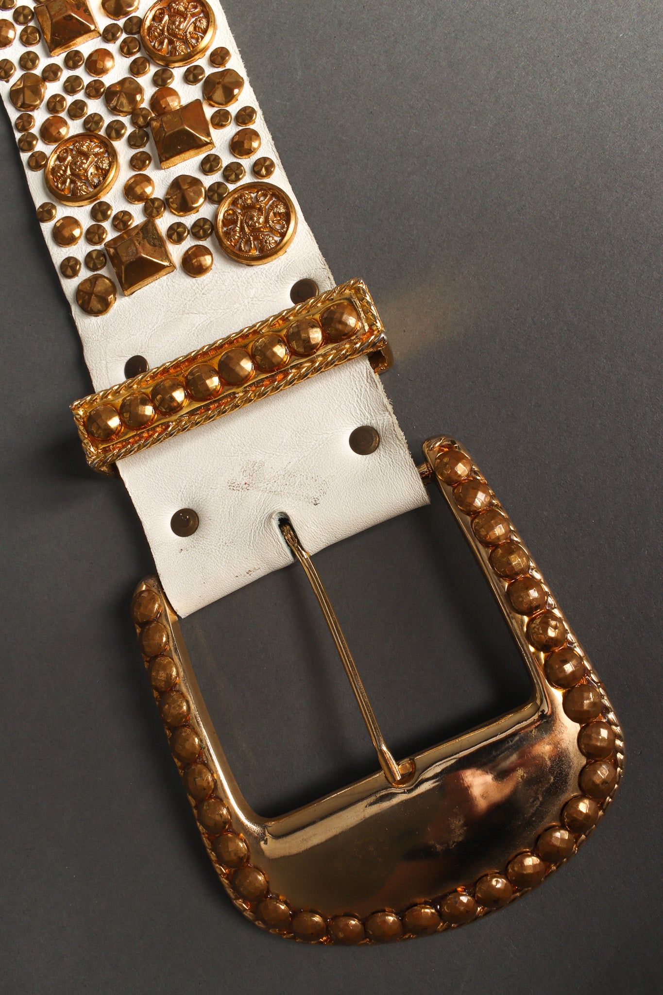 Studded leather belt with assorted gold studs by Michael Morrison close up of buckle  @recessla