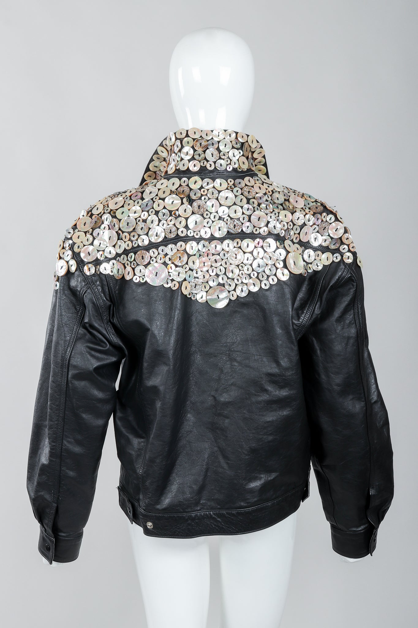 Vintage Michael Morrison Pearl Button Leather Jacket on mannequin, back
