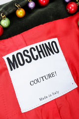 Recess Vintage Moschino Label on Red Fabric