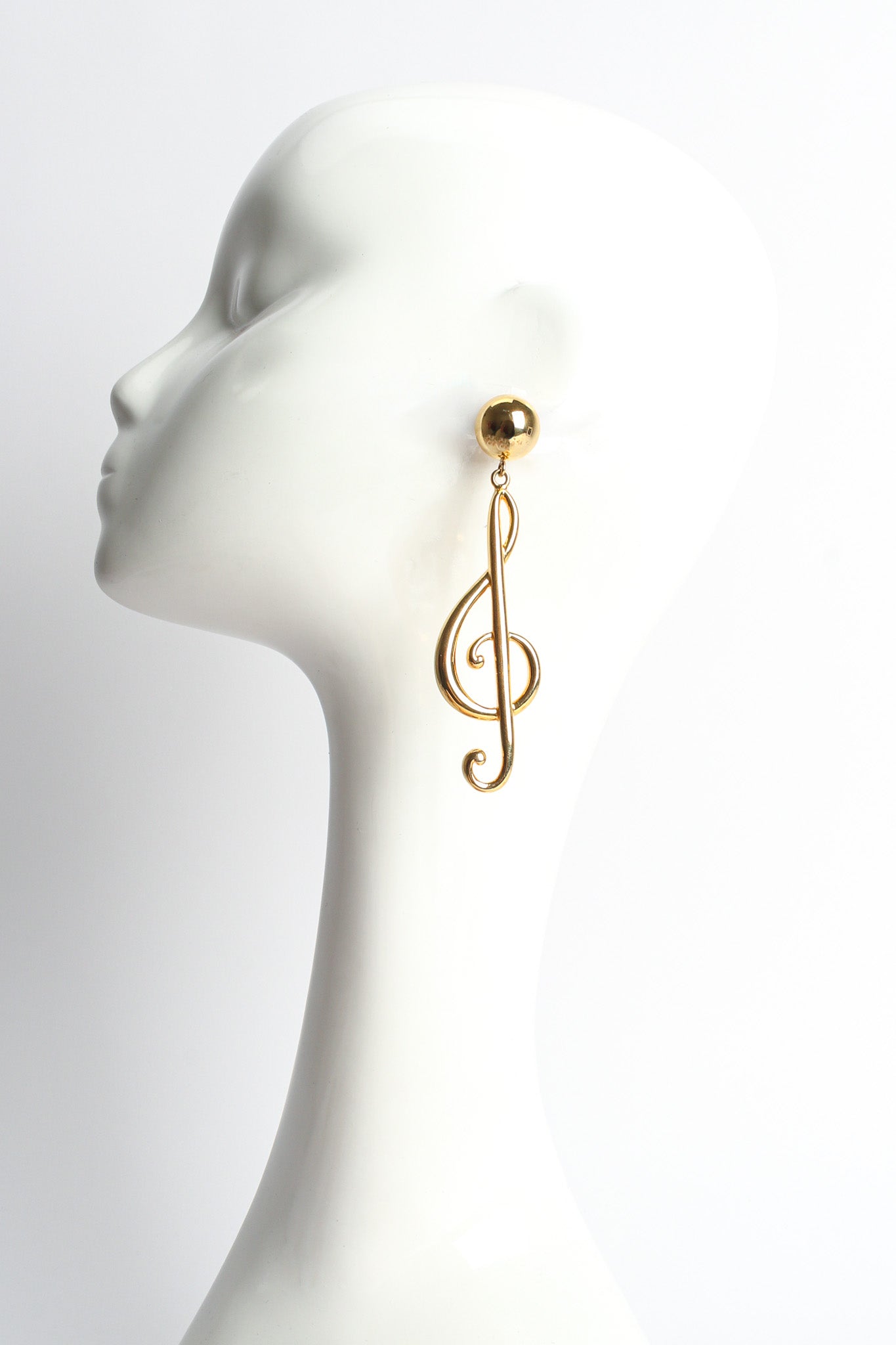 Vintage Moschino Treble Clef Music Note Earrings on mannequin @ Recess LA