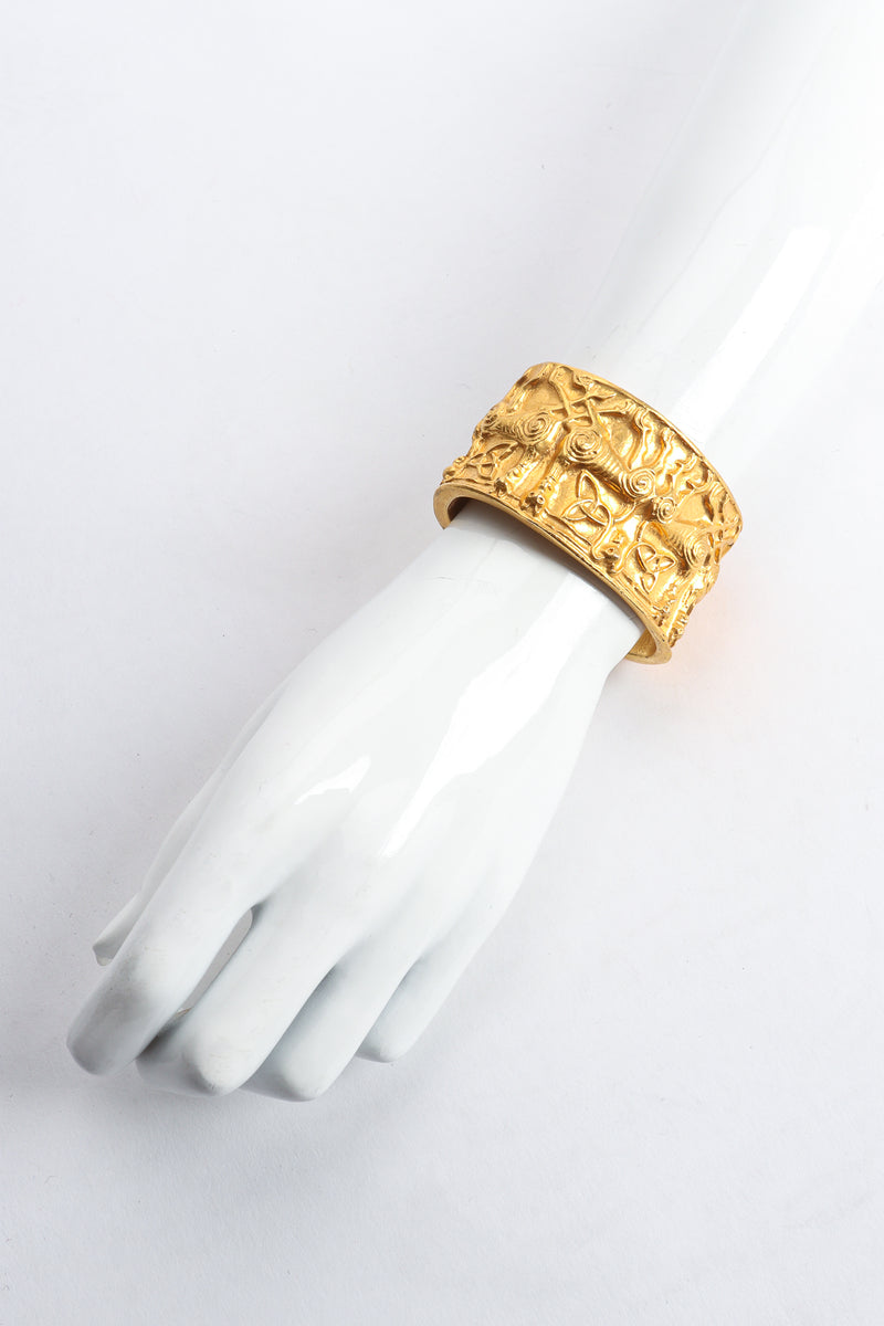 Vintage Metropolitan Museum of Art 1977 NMD Gold Xolo Dog Cuff Bracelet on arm at Recess Los Angeles