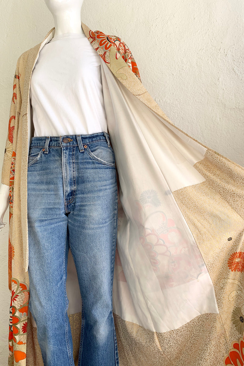 Vintage Japanese Golden Floral Wave Kimono on Mannequin lining at Recess Los Angeles
