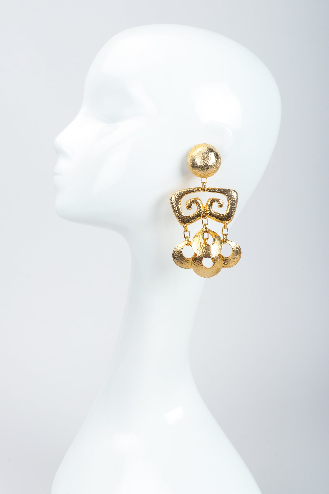 Vintage Brutalist Hammered Gold Chandelier Earrings on Mannequin at Recess Los Angeles