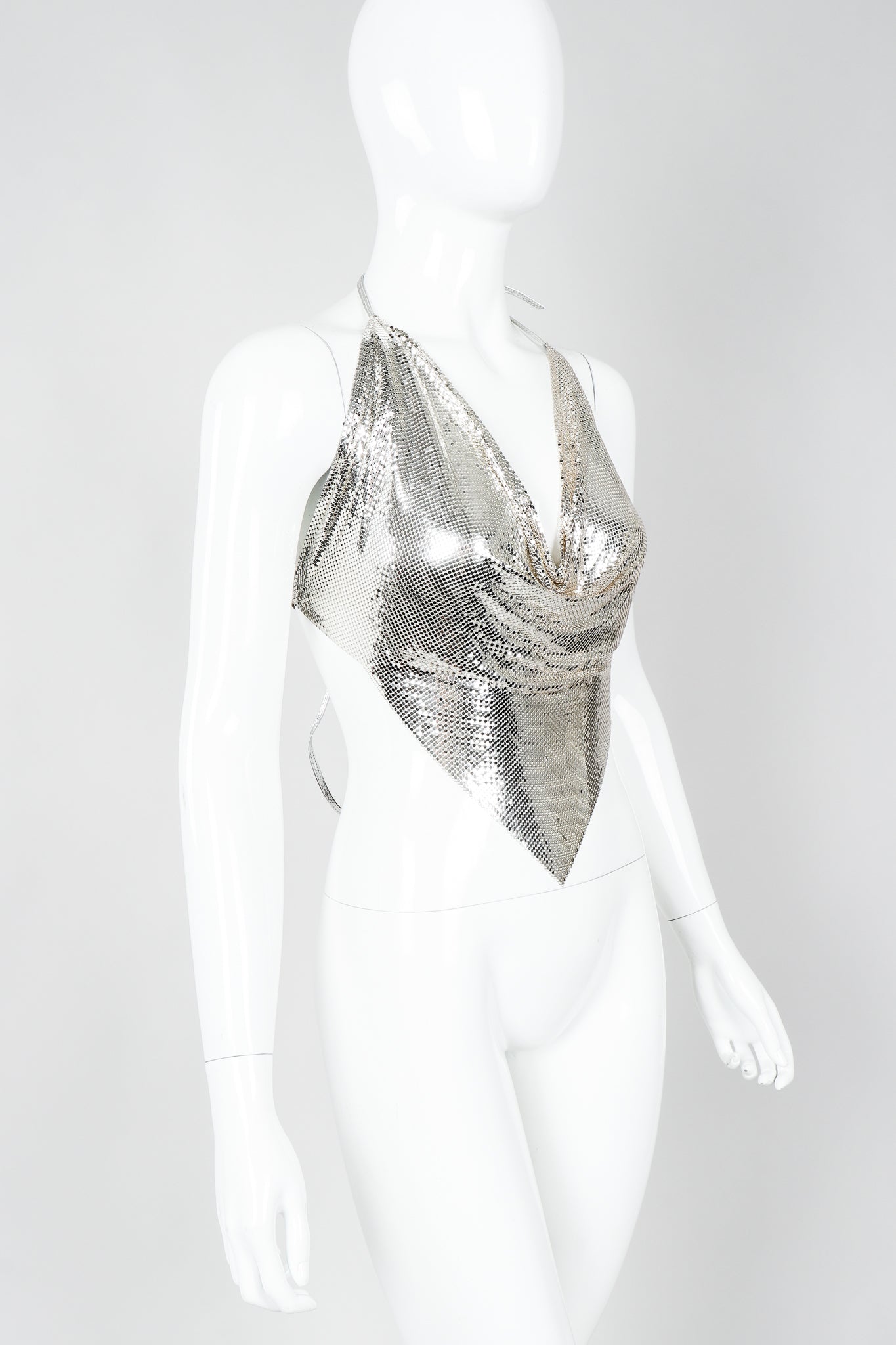 Vintage Whiting & Davis Ferrara Liquid Mercury Metal Mesh Halter Top on mannequin, angled