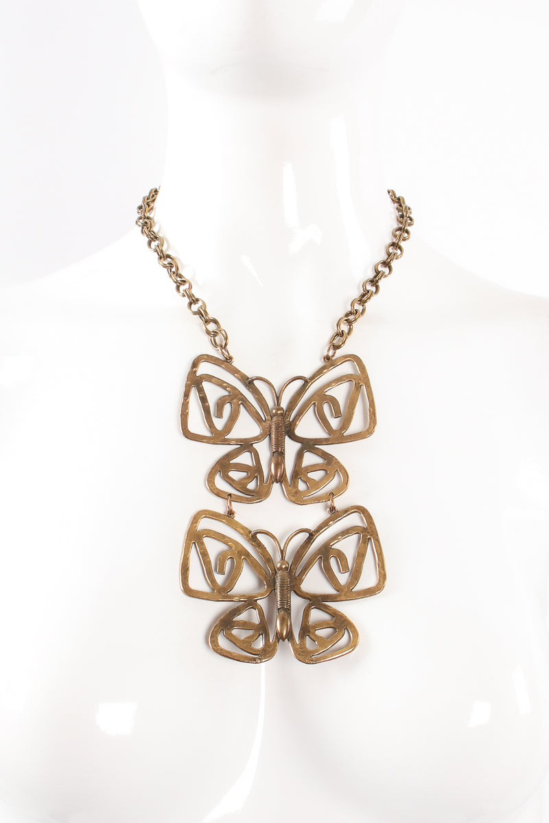 Vintage Brass Double Butterfly Necklace on mannequin at Recess Los Angeles