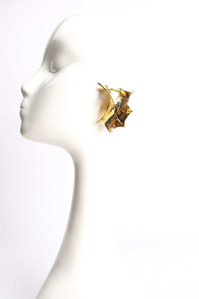 Vintage Schiaparelli-Inspired Sculpted Abstract Leaf Earrings on mannequin at Recess Los Angeles