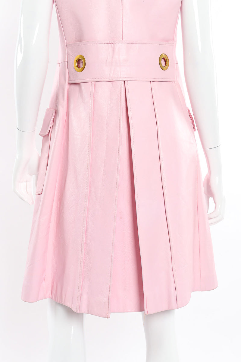 Vintage baby pink leather button front pinafore dress close up back pleats on mannequin @recessla