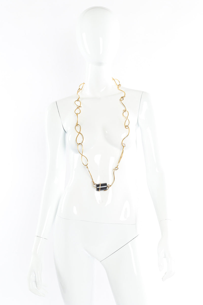 Vintage Nina Ricci Swirl Infinity Wire Necklace on mannequin @ Recess LA