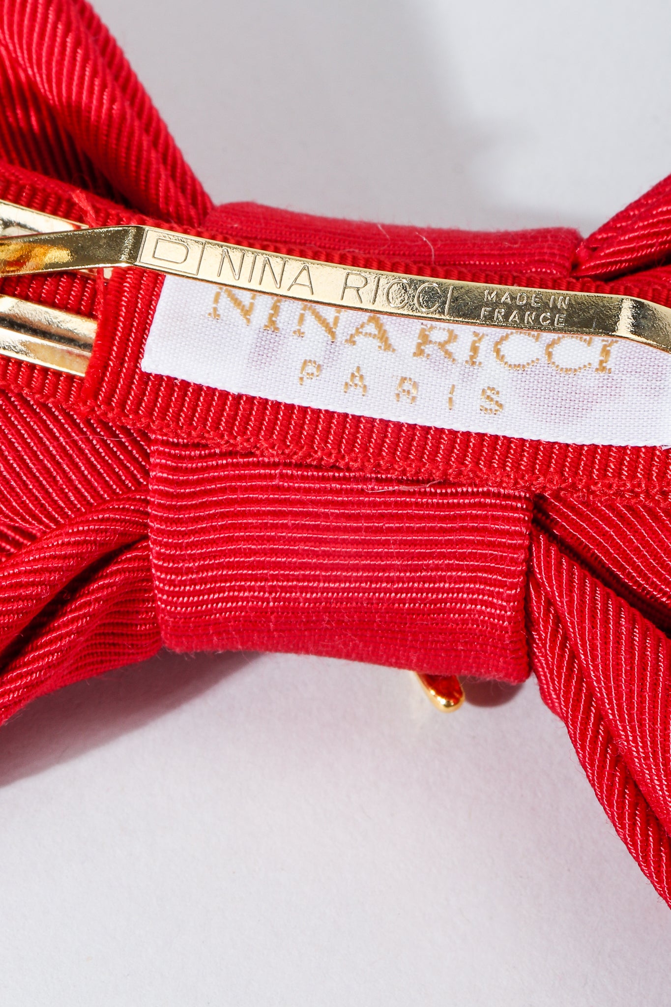 Vintage Nina Ricci Red Logo Bow Barrette Backside and Label