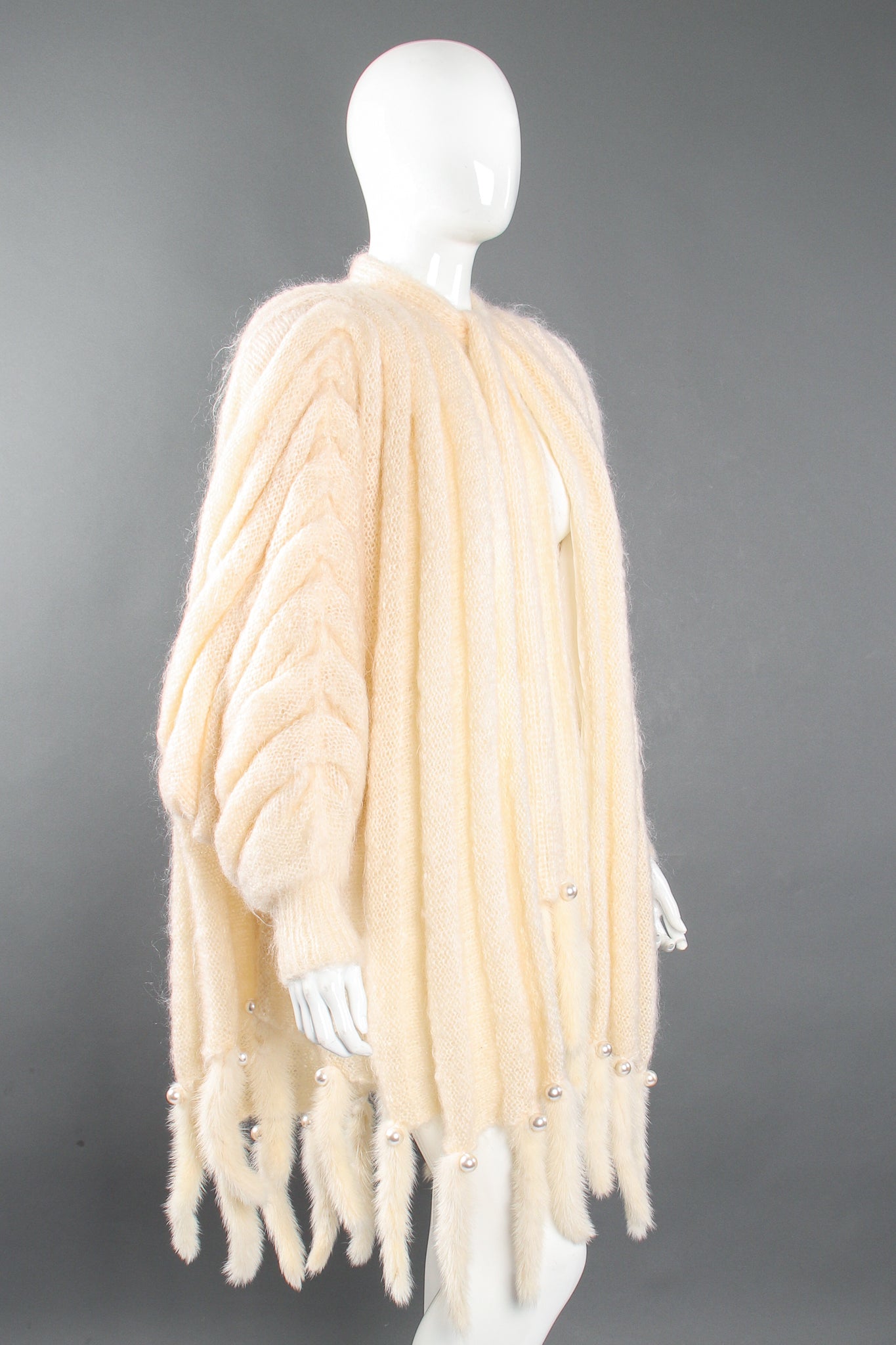 Vintage Nordstrom Fur Trim Batwing Sweater Cape Coat on Mannequin angle at Recess Los Angeles