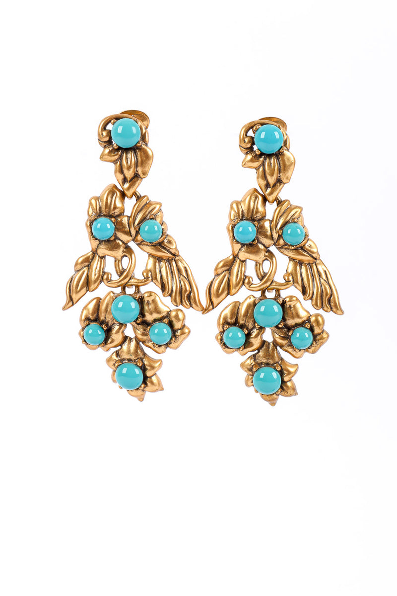 Gold wing earrings by Oscar de la Renta on white background  @recessla