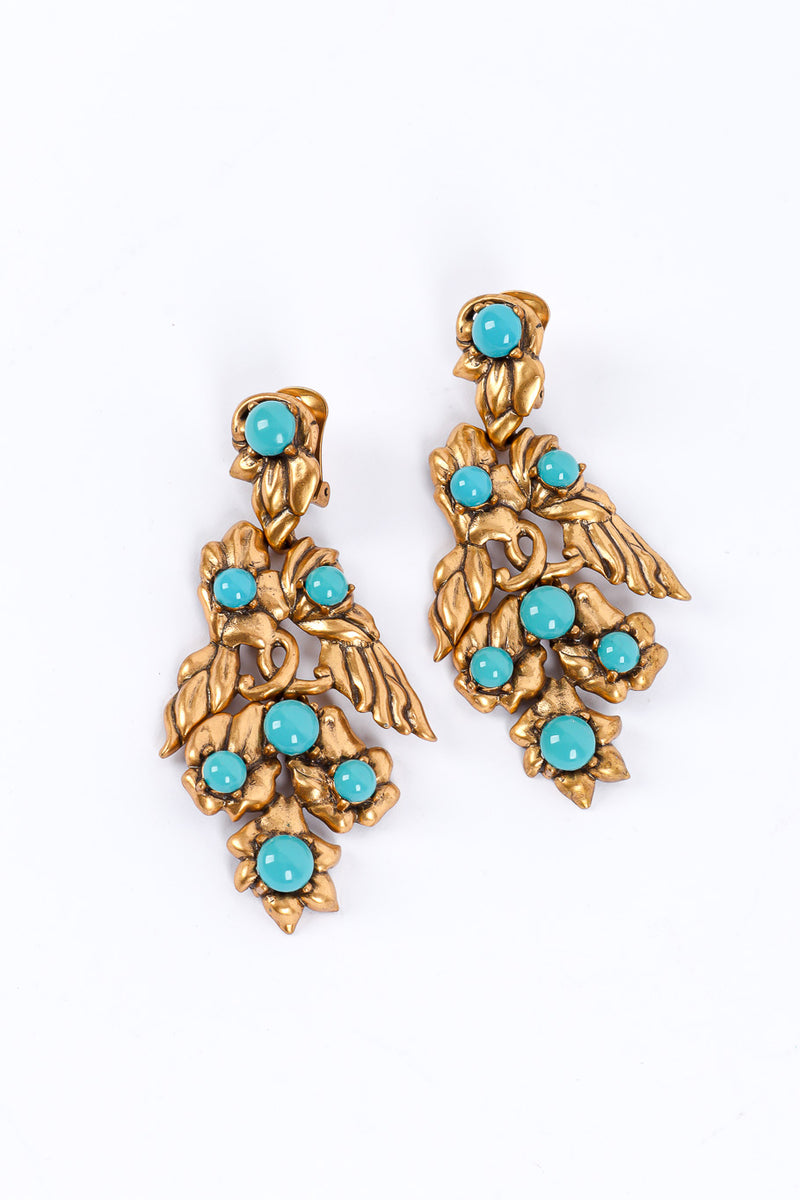 Gold wing earrings by Oscar de la Renta flat lay @recessla