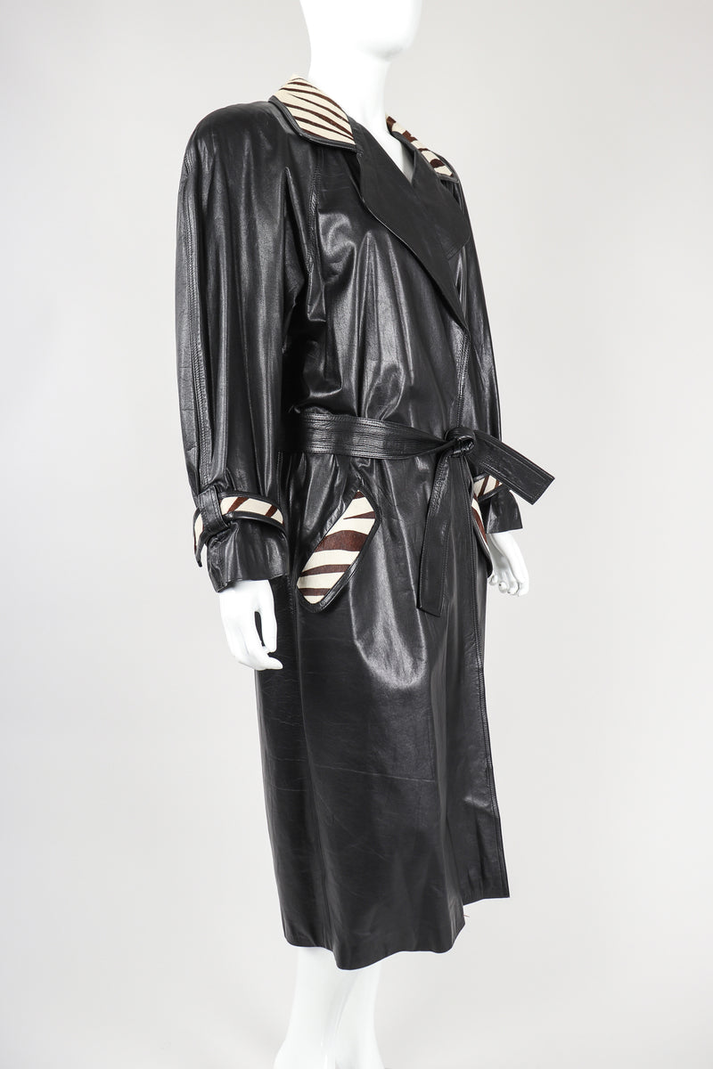 Recess Vintage Pat Hicks Calf Hair Trim Black Leather Trench Coat on Mannequin