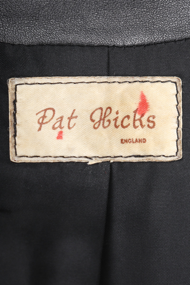 Recess Vintage Pat Hicks label on black fabric
