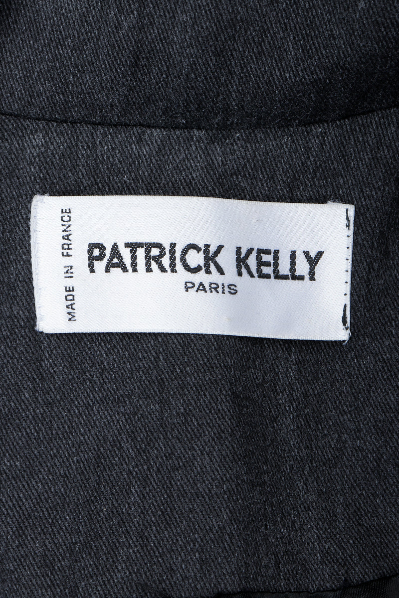 Vintage Patrick Kelly Label on black fabric