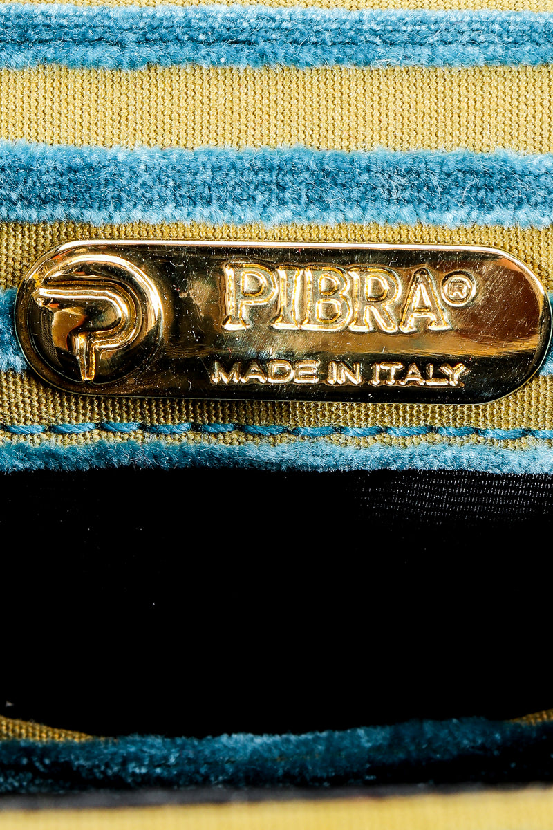 Vintage Pibra metal signature tag on striped velvet