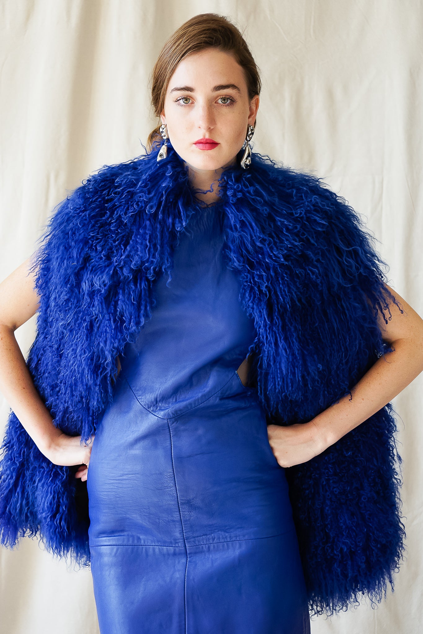 Girl in Vintage Climax Blue Leather Cutout Dress & Mongolian fur at Recess Los Angeles