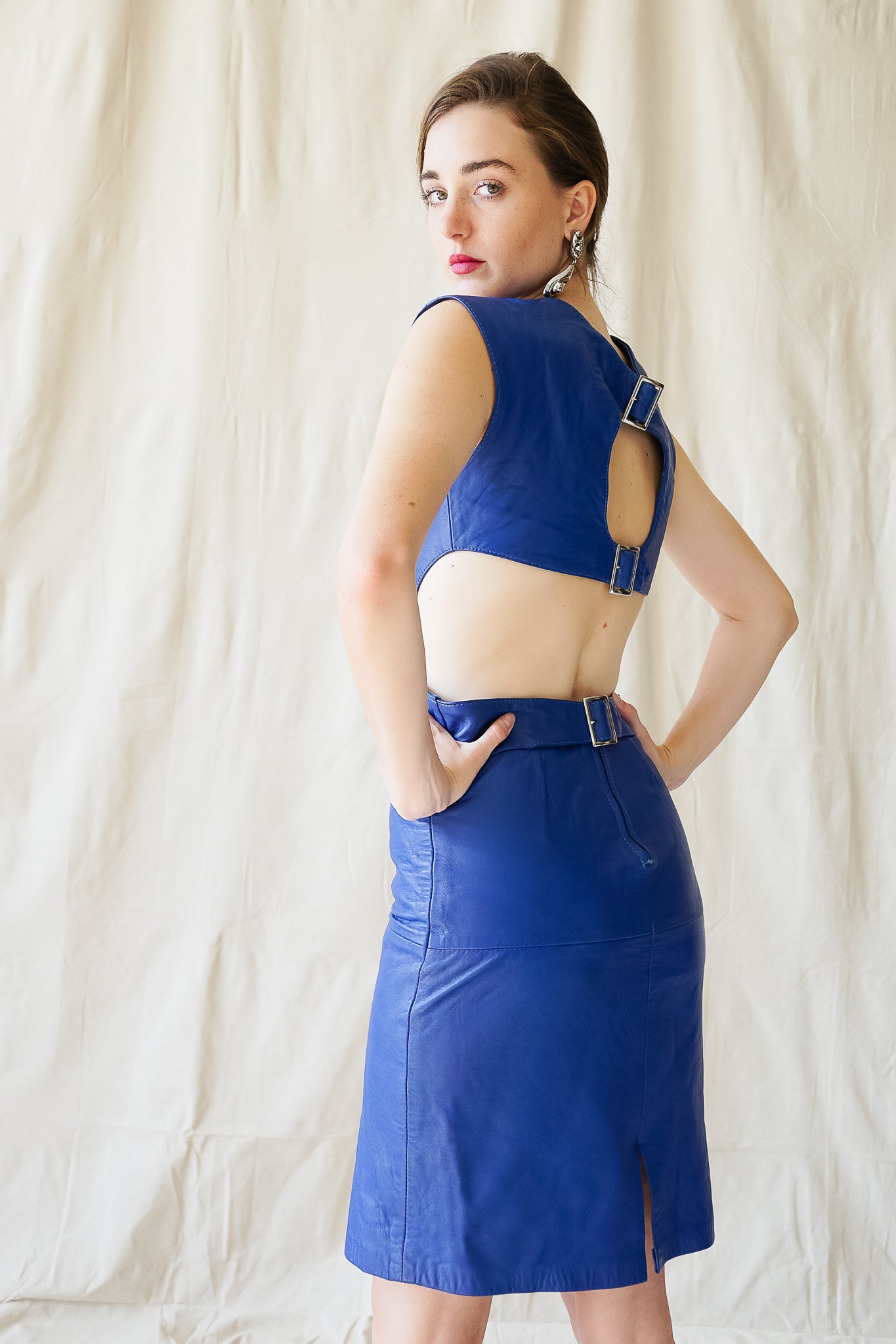 Girl in Vintage Climax Blue Leather Cutout Dress at Recess Los Angeles