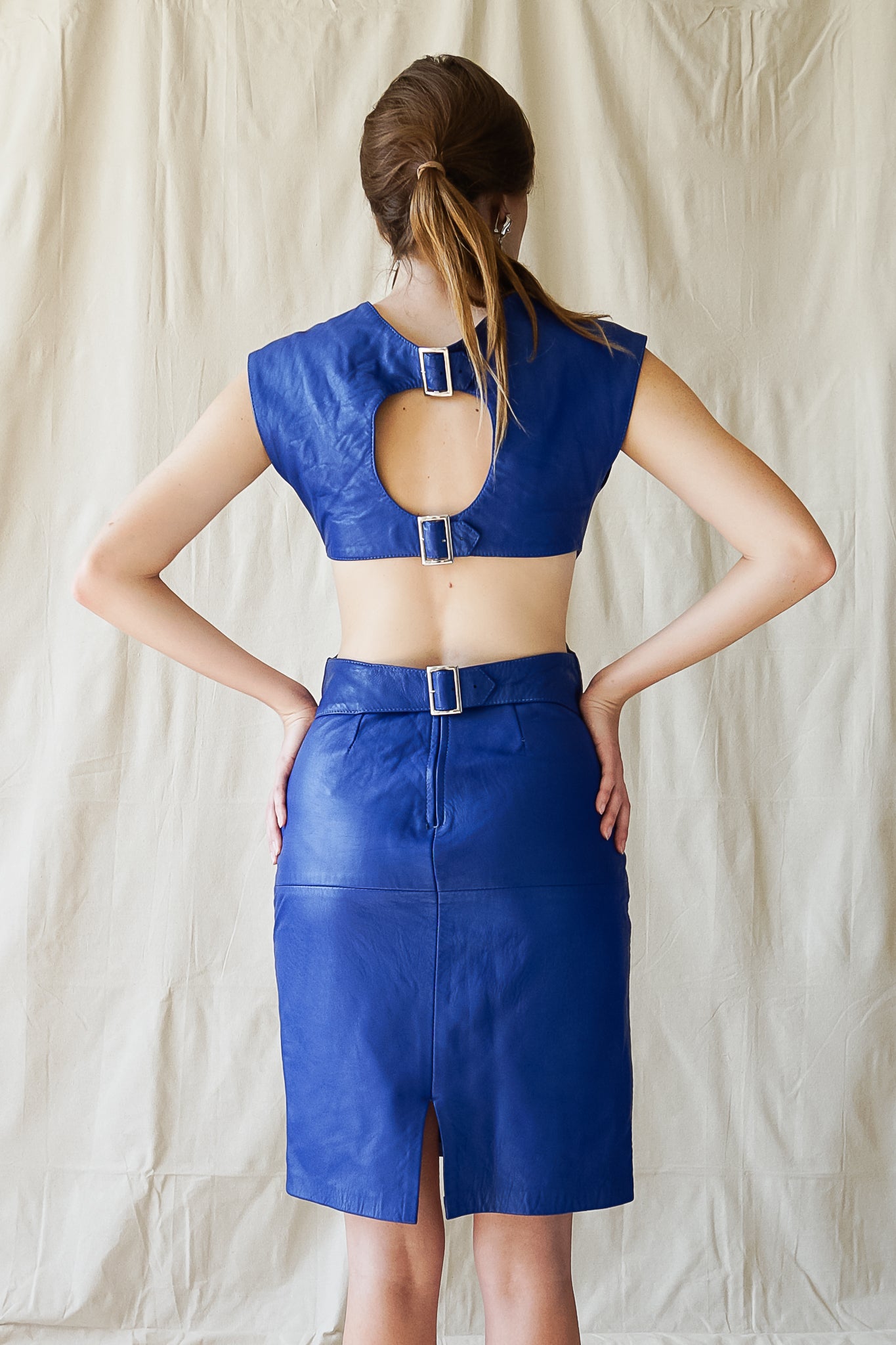Girl in Vintage Climax Blue Leather Cutout Dress Back at Recess Los Angeles