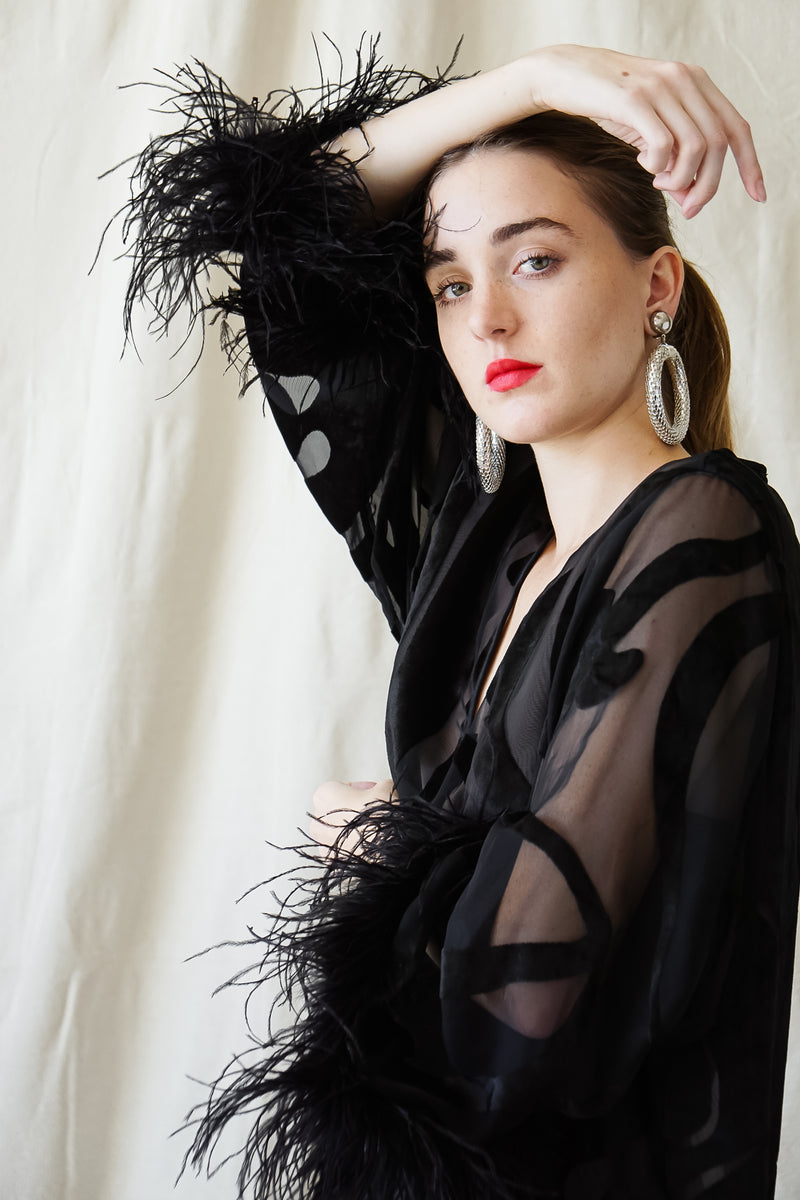 girl in Vintage Valentino Sheer Silk Velvet Burnout Ostrich Trim Caftan Dress at Recess LA