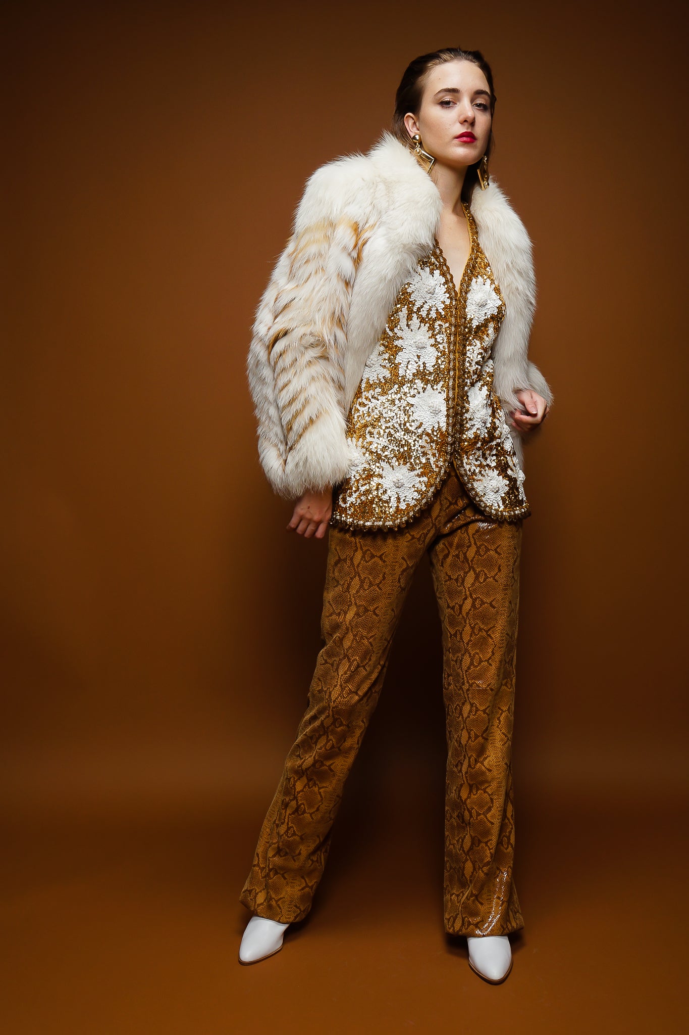 girl in Vintage Valentina Sequined Blossom Burst Vest and fox fur on brown at Recess Los Angeles