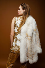 girl in Vintage Valentina Sequined Blossom Burst Vest and fox fur on brown at Recess Los Angeles