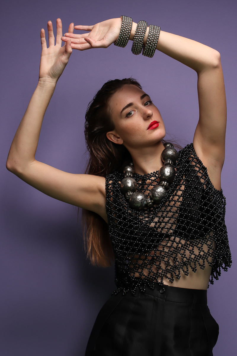 girl in black bead top and Vintage India Hammered Ball Collar Necklace on purple at Recess LA