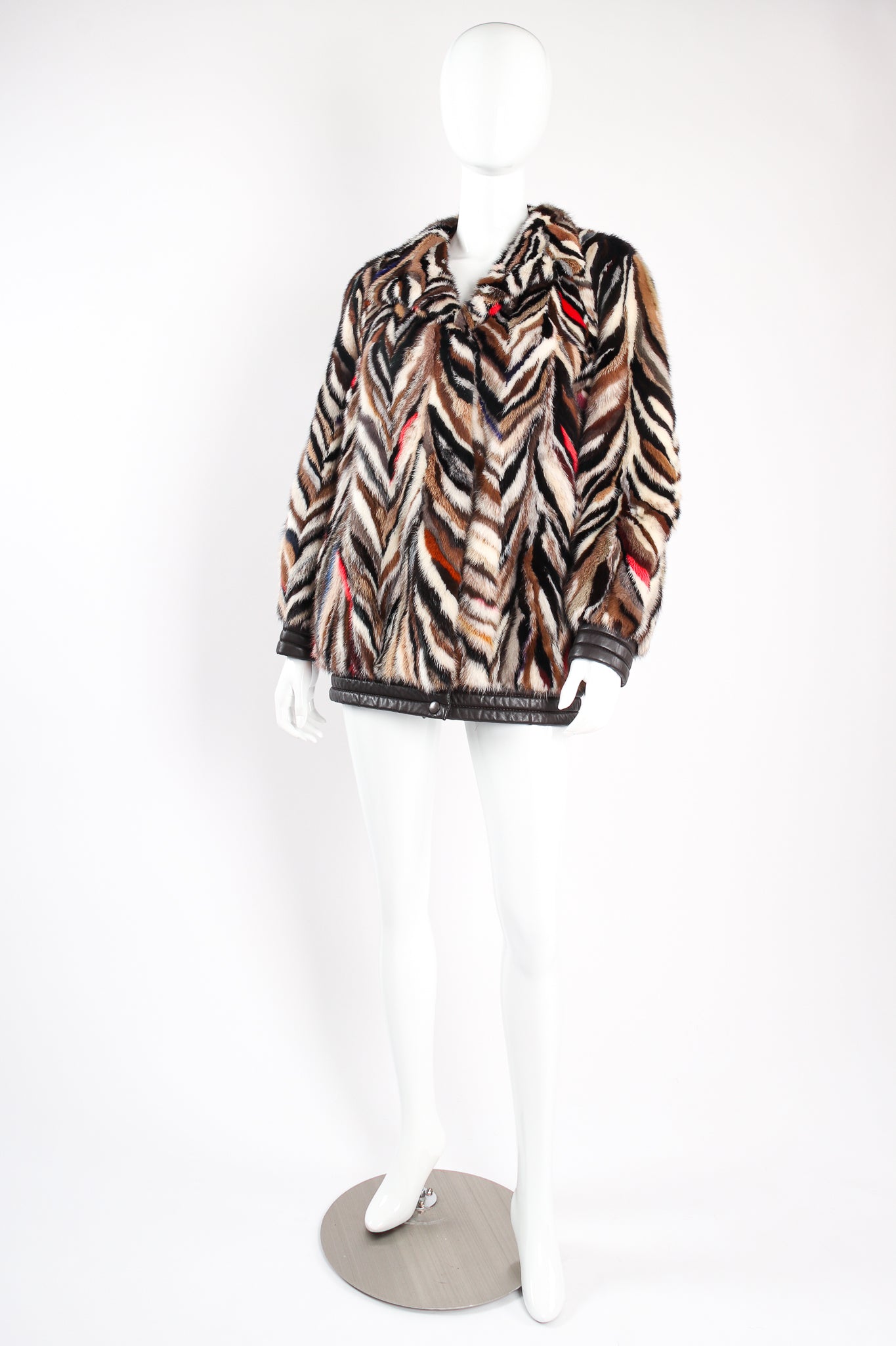 Vintage Pihl Pels Chevron Tiger Stripe Fur Coat on Mannequin angle at Recess Los Angeles