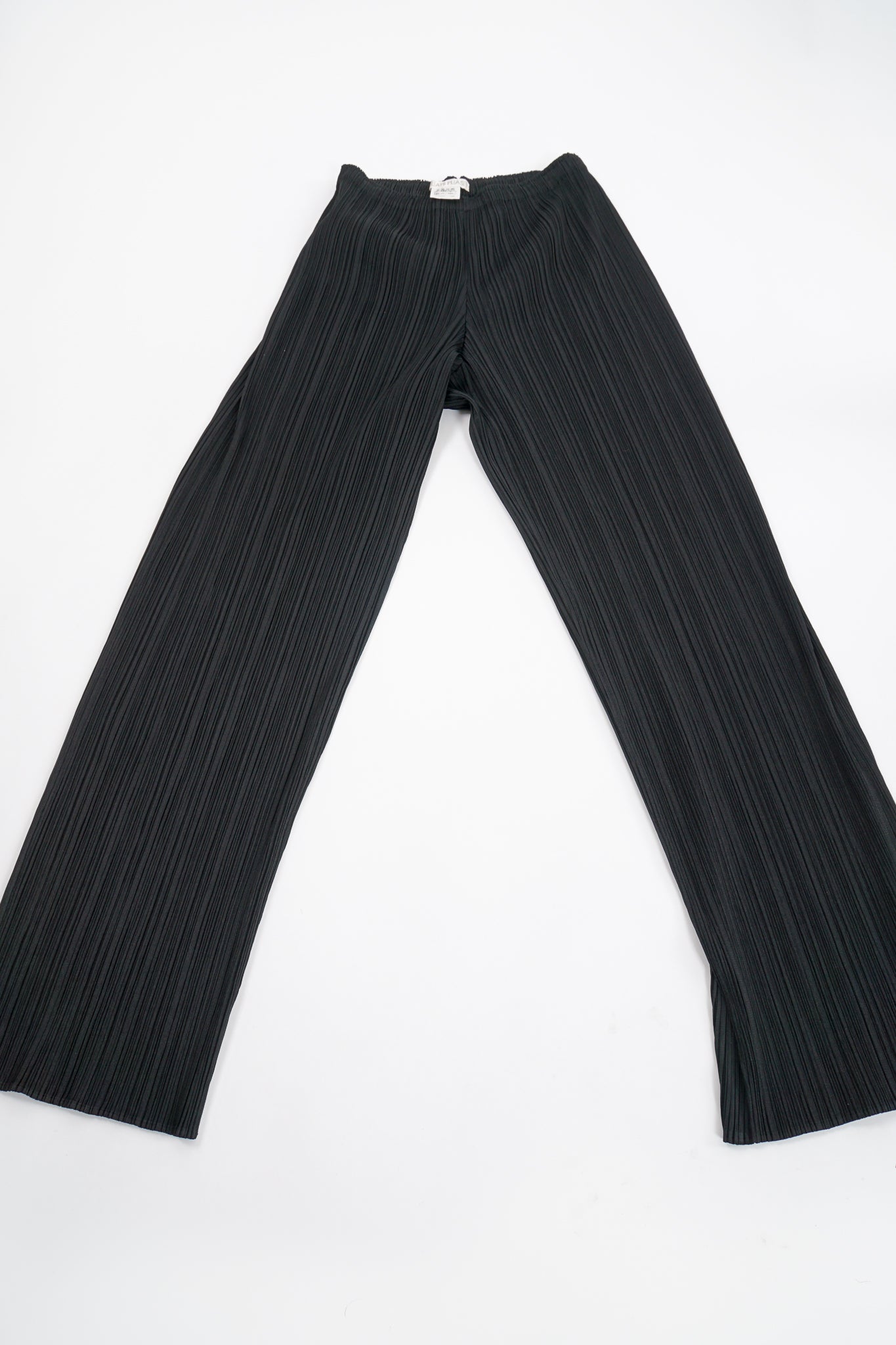 Vintage Issey Miyake Pleats Please Black Pleated Ankle Pant flat at Recess Los Angeles
