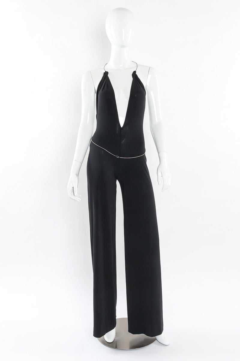 Black lycra backless halter jumpsuit with y-chain belt detail by Plein Sud front mannequin view @recessla