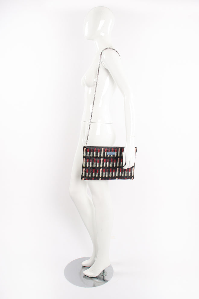 Prada AW 2018 Lipstick Print Leather Convertible Clutch on Mannequin at Recess Los Angeles