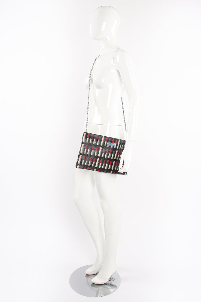 Prada AW 2018 Lipstick Print Leather Convertible Clutch on Mannequin at Recess Los Angeles